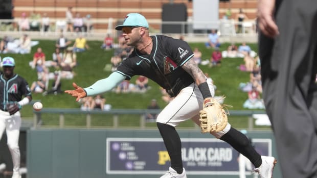 Christian Walker flips ball , February 27th, 2024